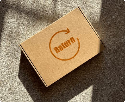 a_cardboard_box_with_return_symbol